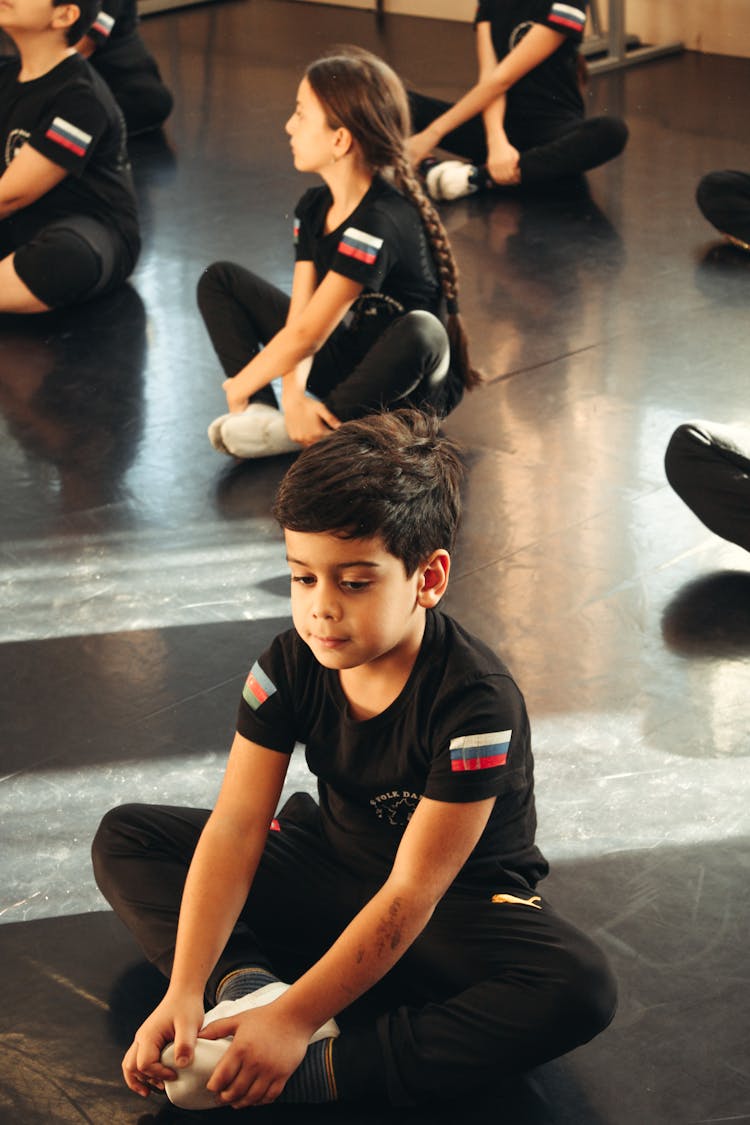 Children Exercising In Gym