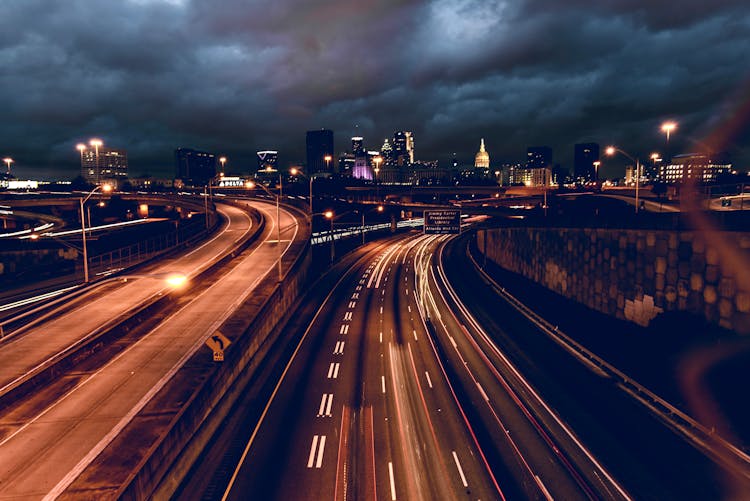 An Aerial Shot Of A Highways At Night