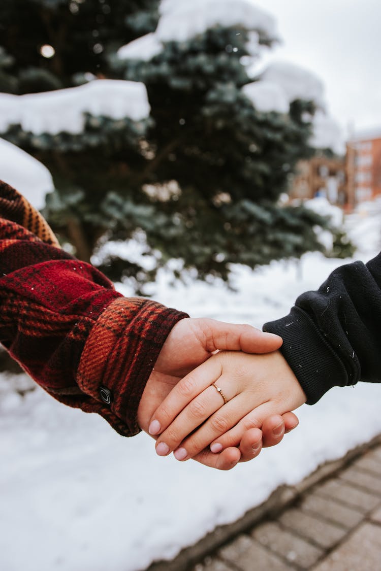 Man And Woman Holding Hands