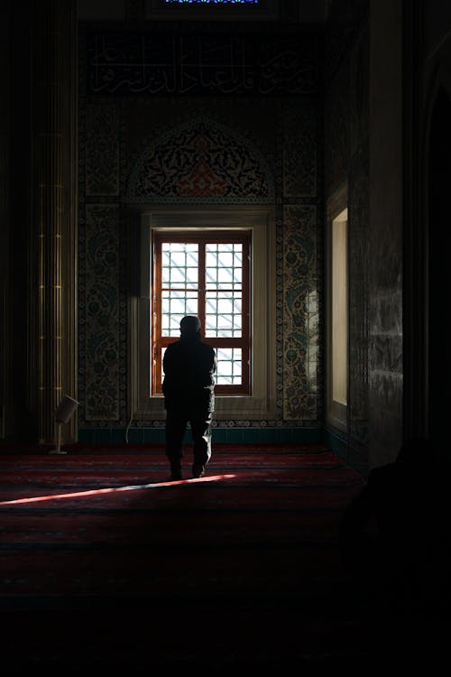 Man in Darkness at Mosque