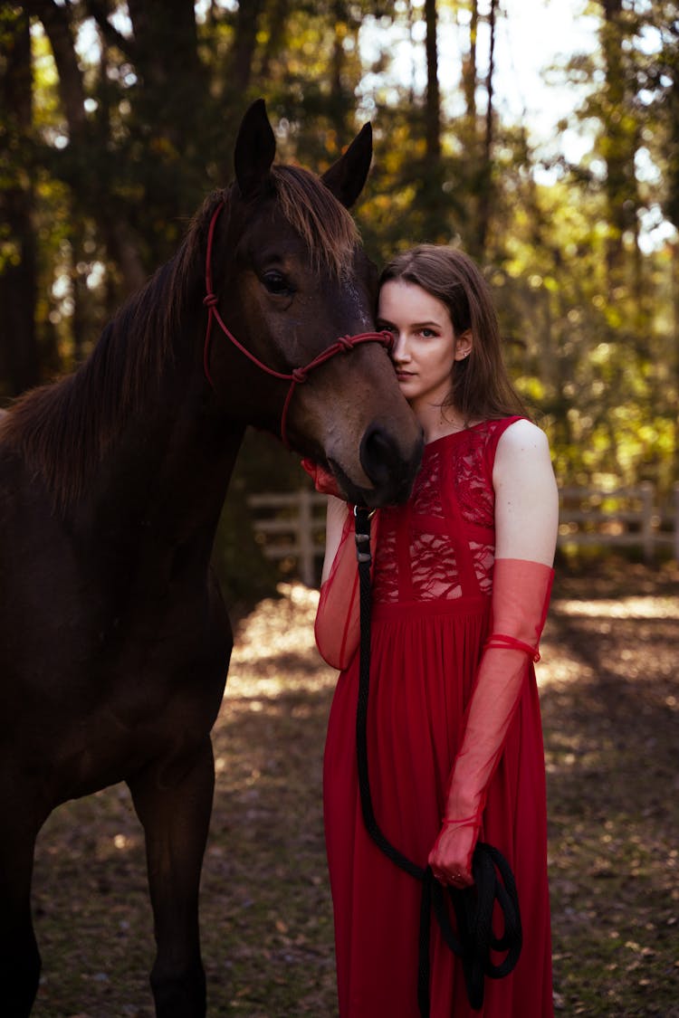 Woman In Red Dress With Horse