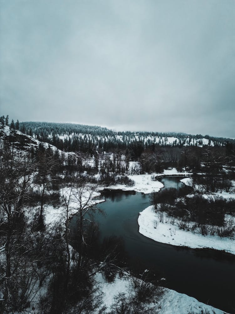 View Of A Winding River In Winter