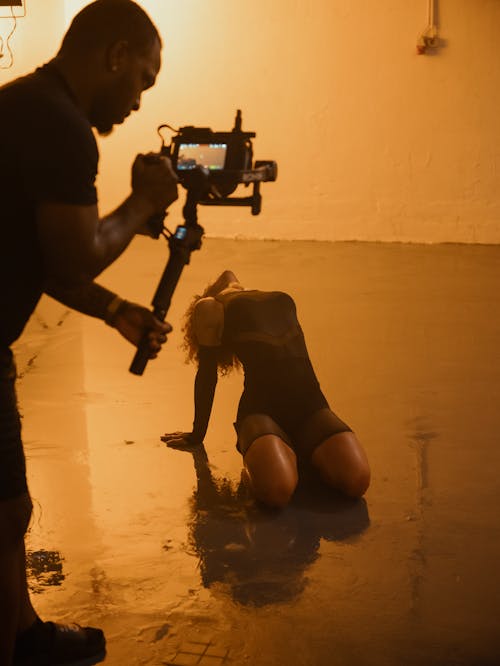 Female Fashion Model Posing During a Shoot in an Empty Room