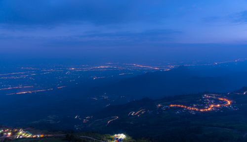 Free A mesmerizing aerial view of city lights twinkling at night in Thailand. Captured with precision. Stock Photo