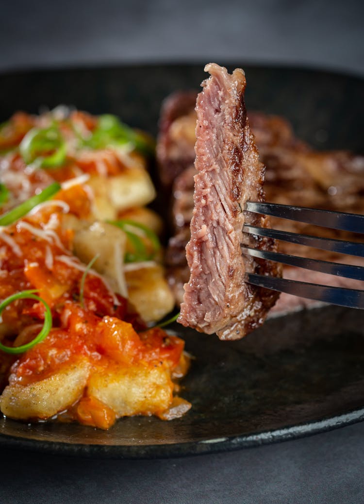 Slice Of Steak On Fork