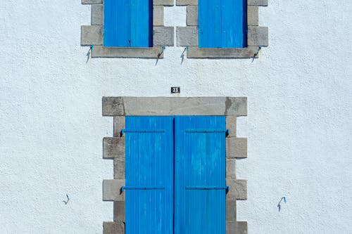 Kostnadsfri bild av blå dörrar, byggnadsexteriör, dörr