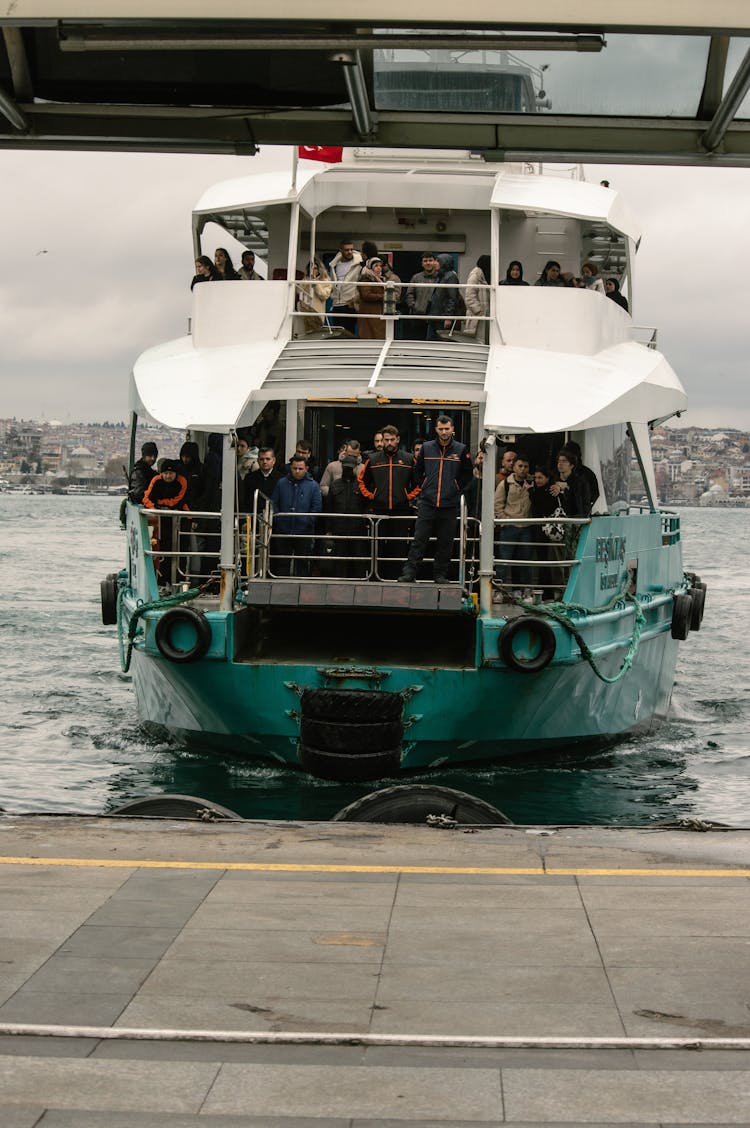 People On Ferry In Harbor