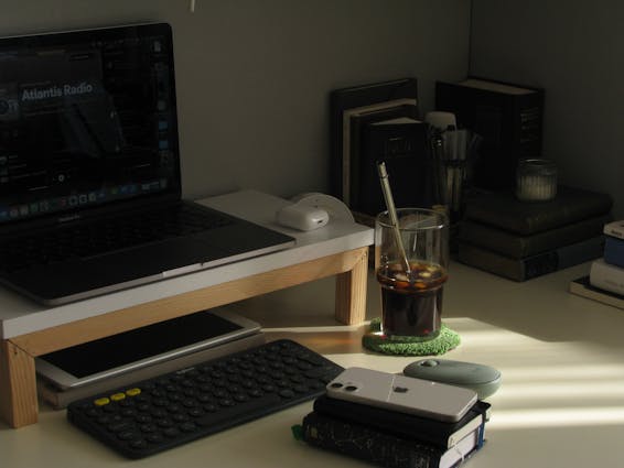 Laptop and Gadgets on Home Office Table