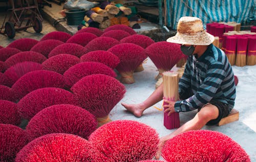 A Man with Incense Sticks