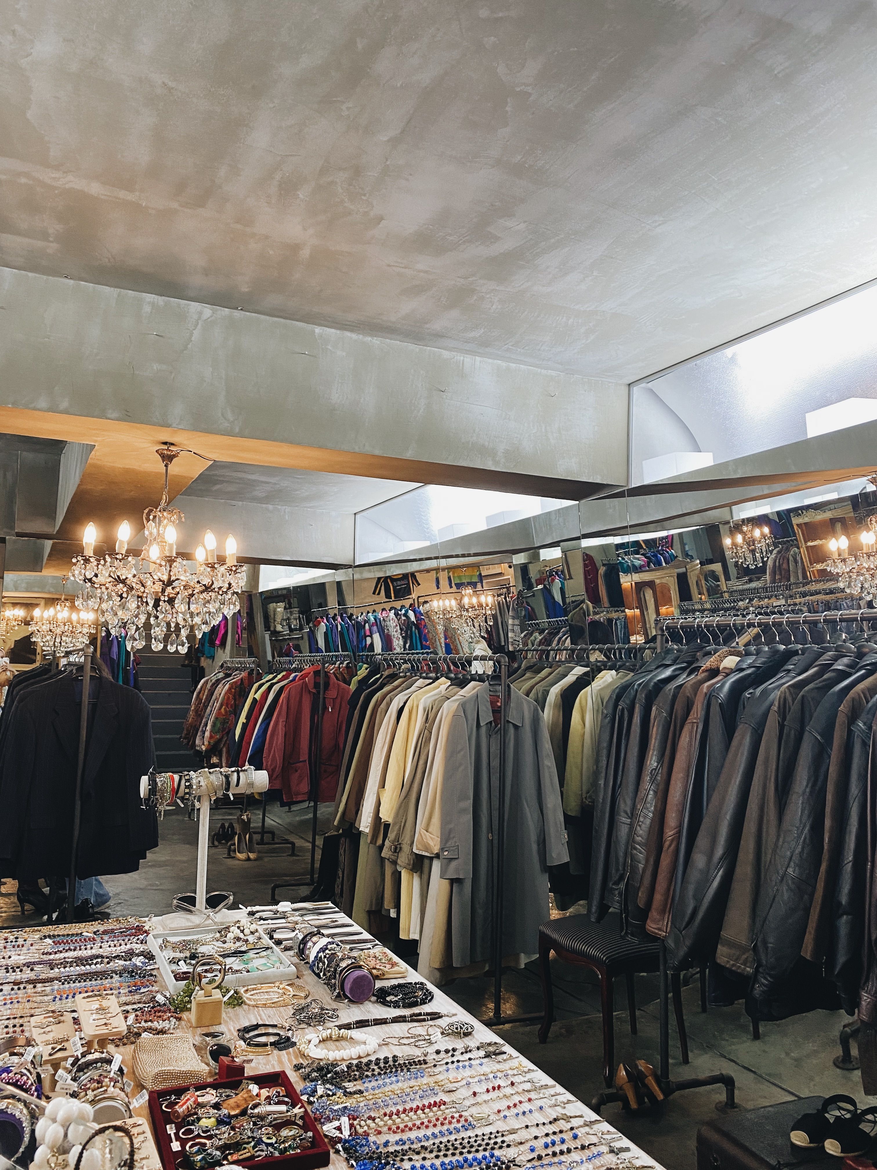 The racks under the chandeliers, restocked for the drop