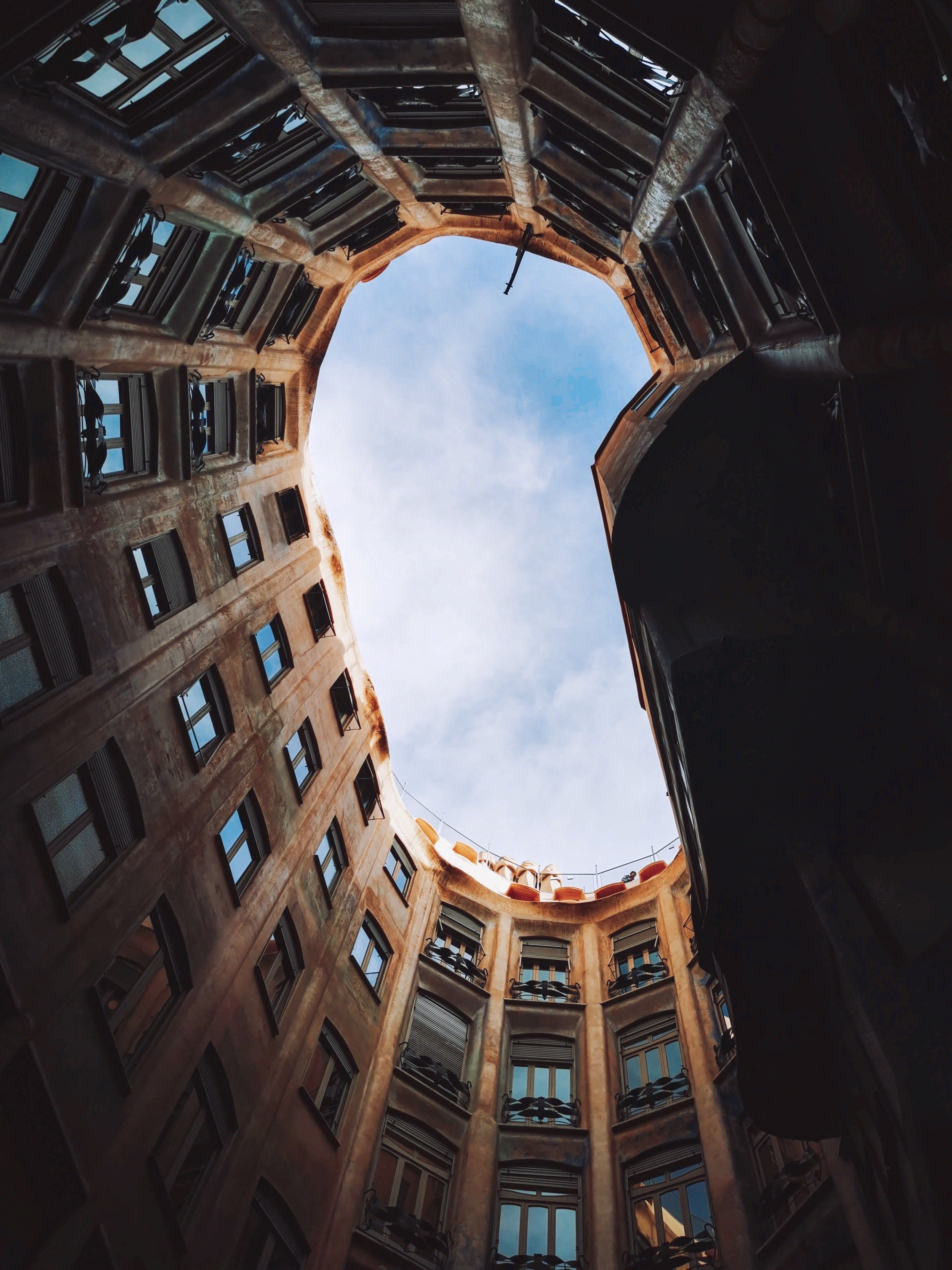 Low Angle Shot of Brown Concrete Building · Free Stock Photo