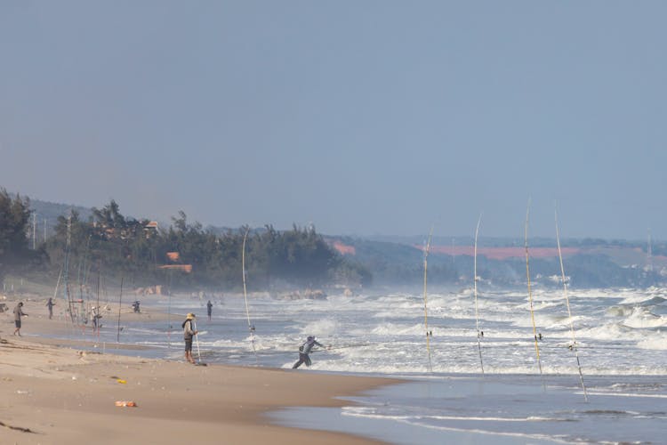 Fishermen On Beach