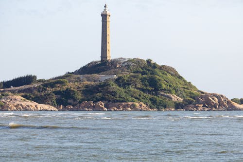Photograph of an Island with a Lighthouse
