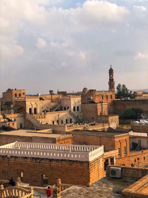 Free Scenic view of historic Midyat with its iconic minaret and stone buildings in Mardin, Turkey. Stock Photo