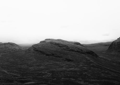 Free Captivating grayscale mountain landscape in Vännäs, Sweden, showcasing rugged terrain under a vast sky. Stock Photo