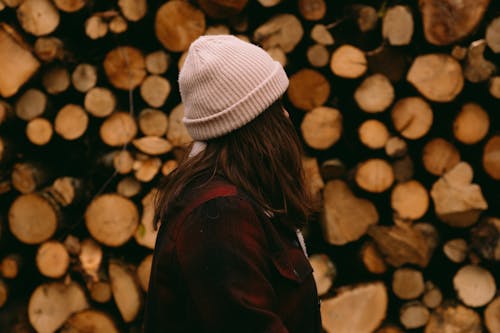 Side View of a Woman Wearing a Beanie