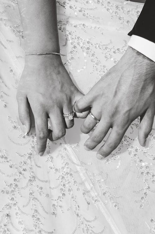 Bride and Groom Holding Hands