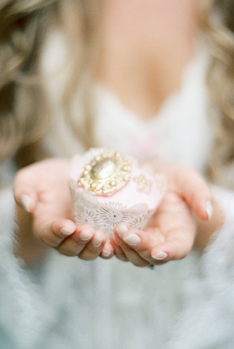 Bride Holding Cupcake