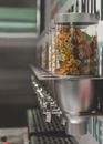 Selective Focus Photography of Candy Dispenser