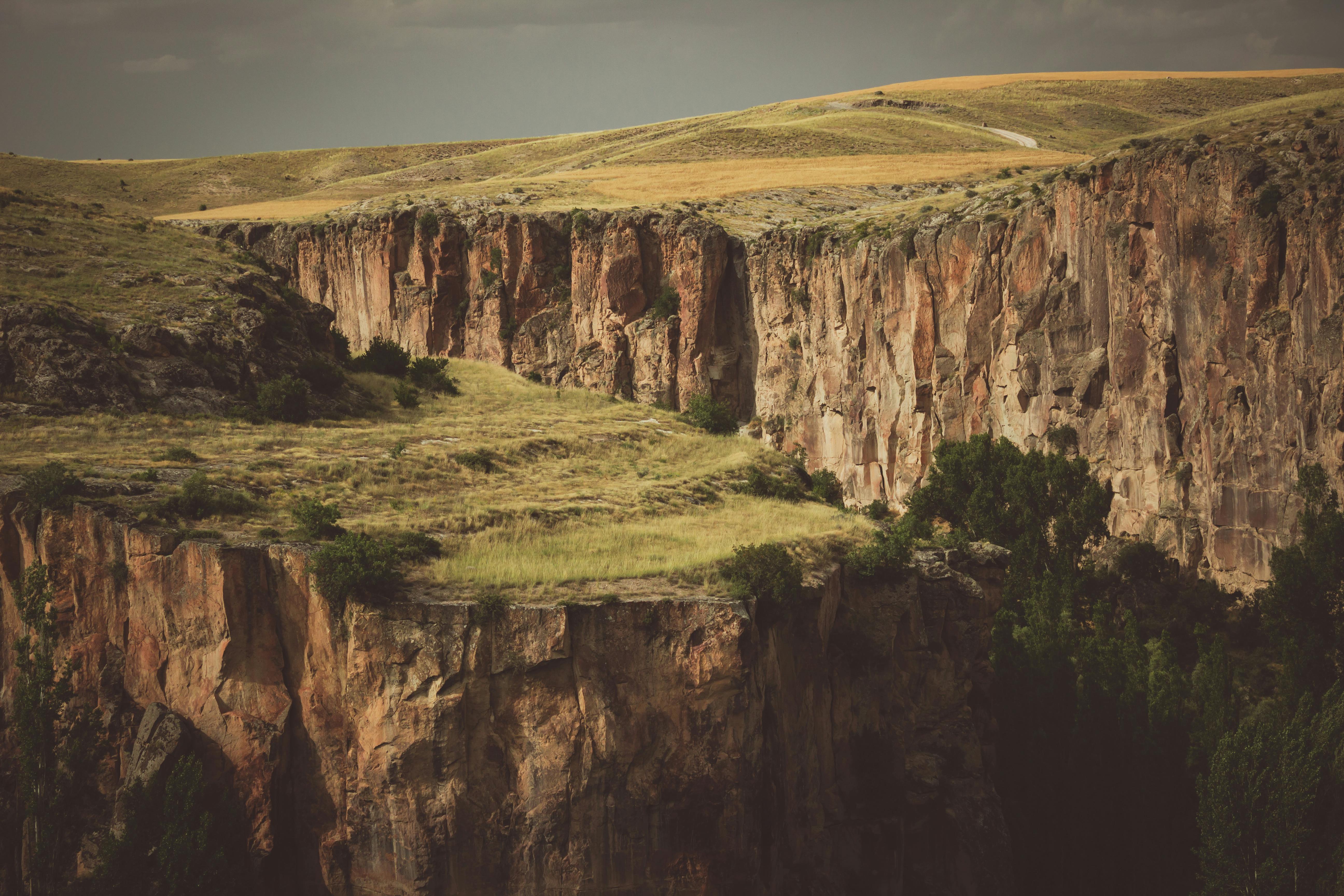 Ihlara Valley canyon with Melendiz River flowing through, Byzantine rock-cut churches, lush poplar trees, Cappadocia Turkey
