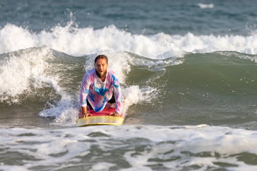 Základová fotografie zdarma na téma muž, surfař, surfovací prkno