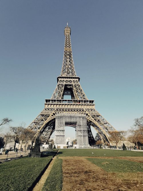 Free Stunning view of the iconic Eiffel Tower in Paris, capturing its architectural beauty. Stock Photo