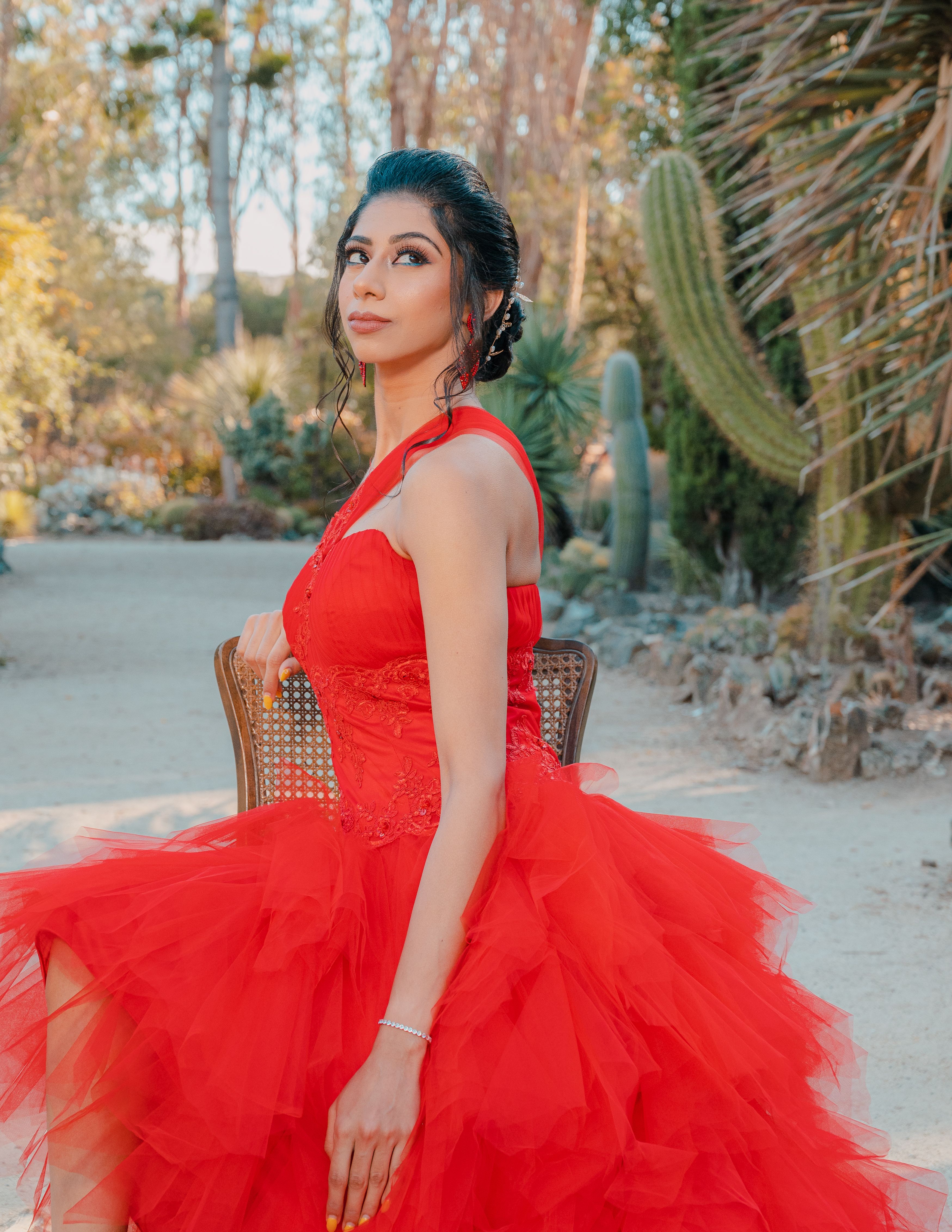 A Woman Wearing Red Gown · Free Stock Photo