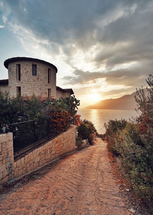 A Path and a Building on a Seashore 