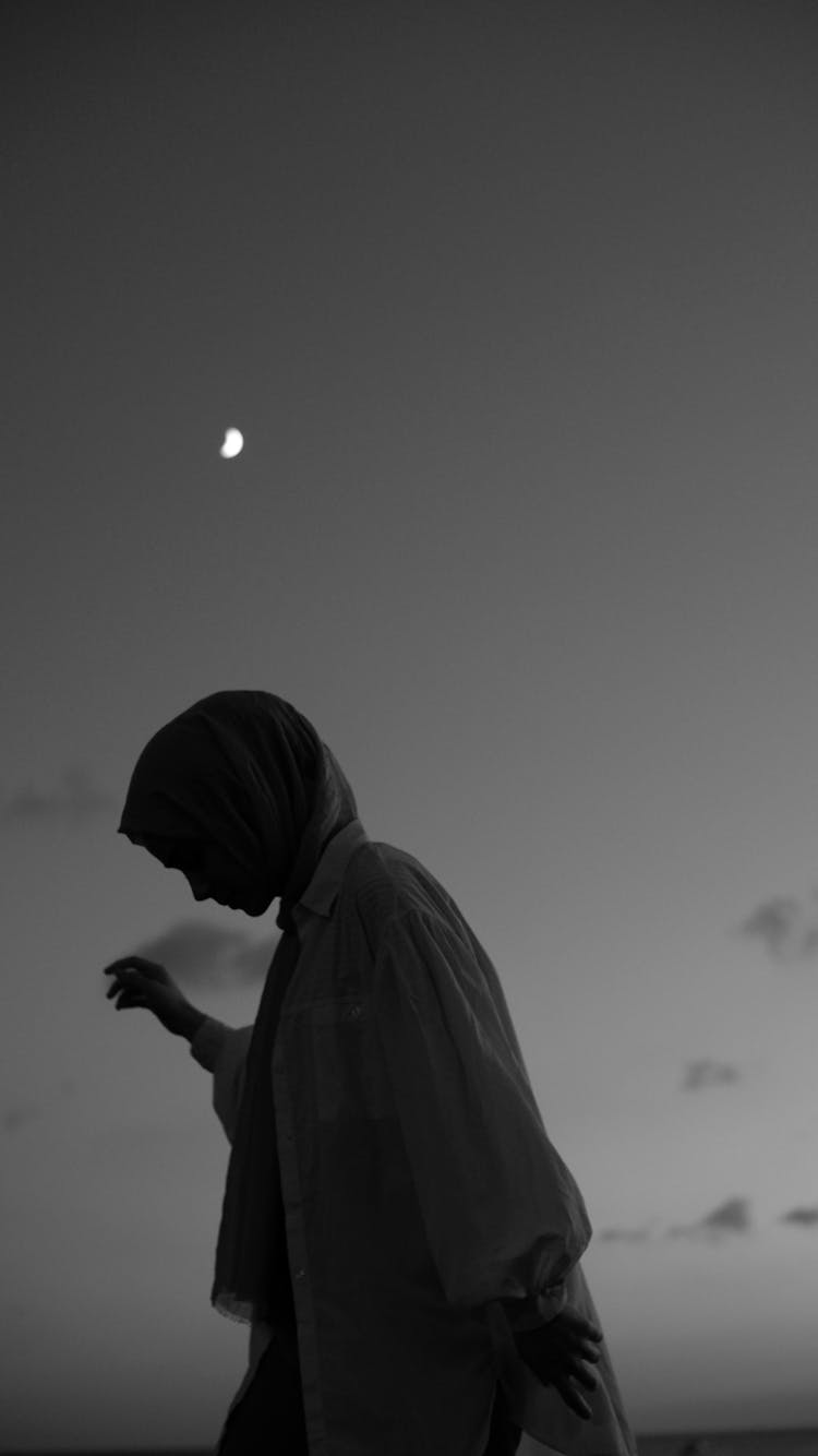 Woman Posing Against Night Sky