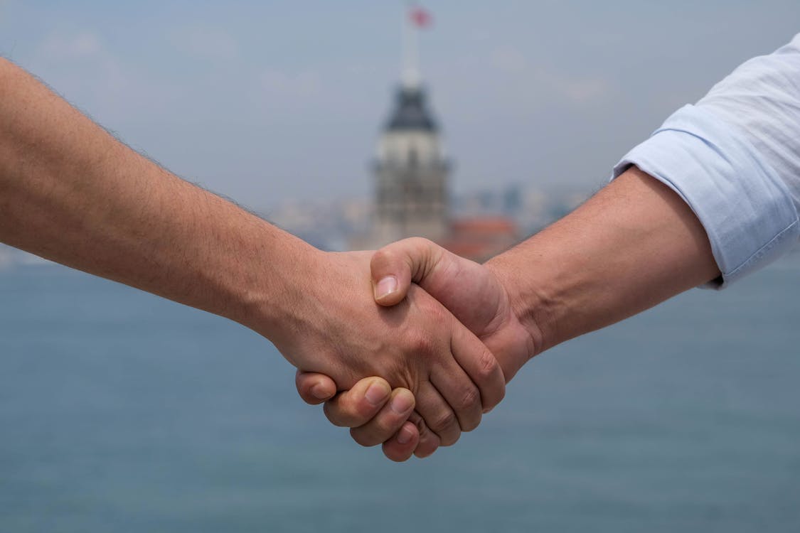 406 Four Hands Handshake Stock Photos - Free & Royalty-Free Stock Photos  from Dreamstime