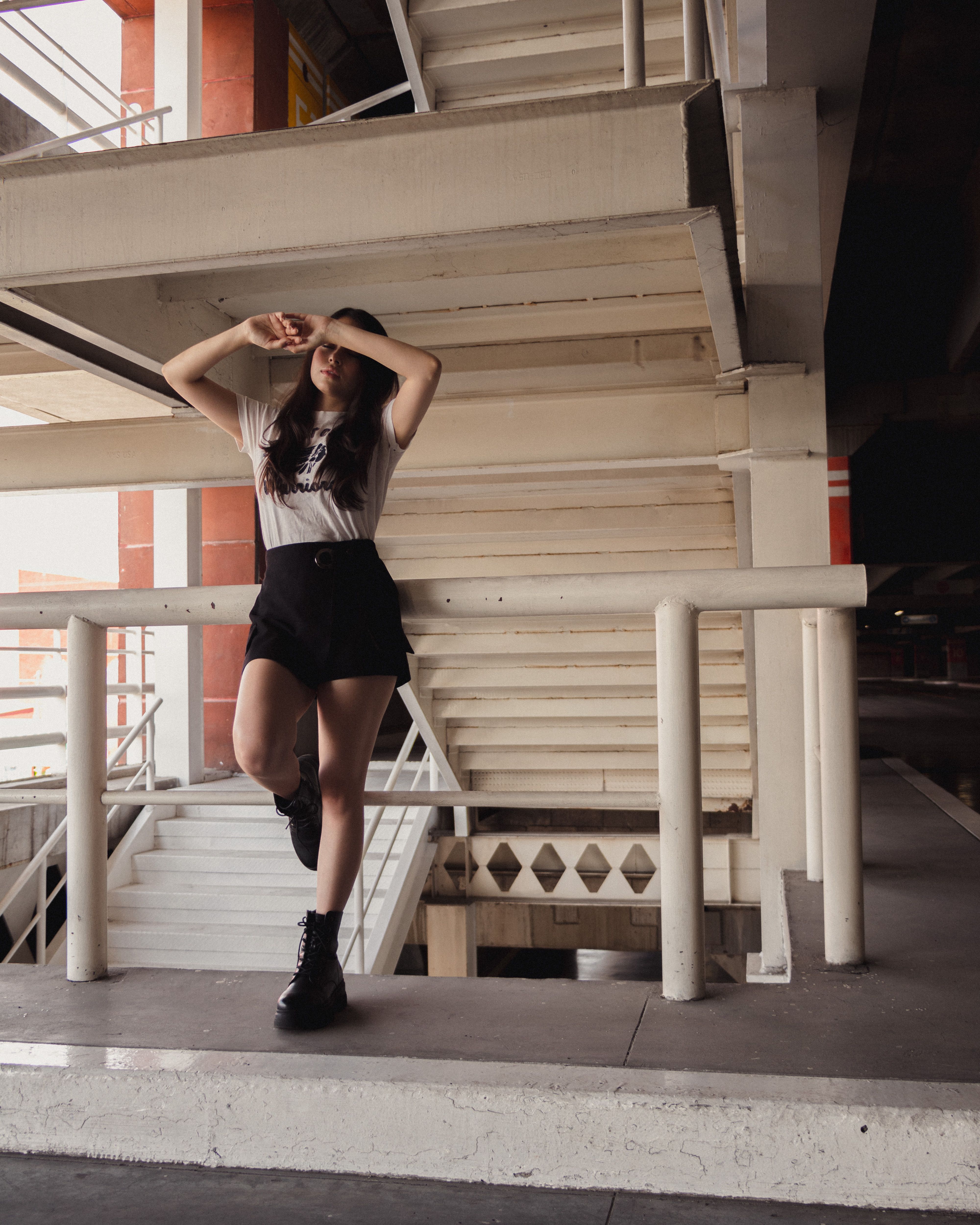 A Woman Posing by the Handrail · Free Stock Photo