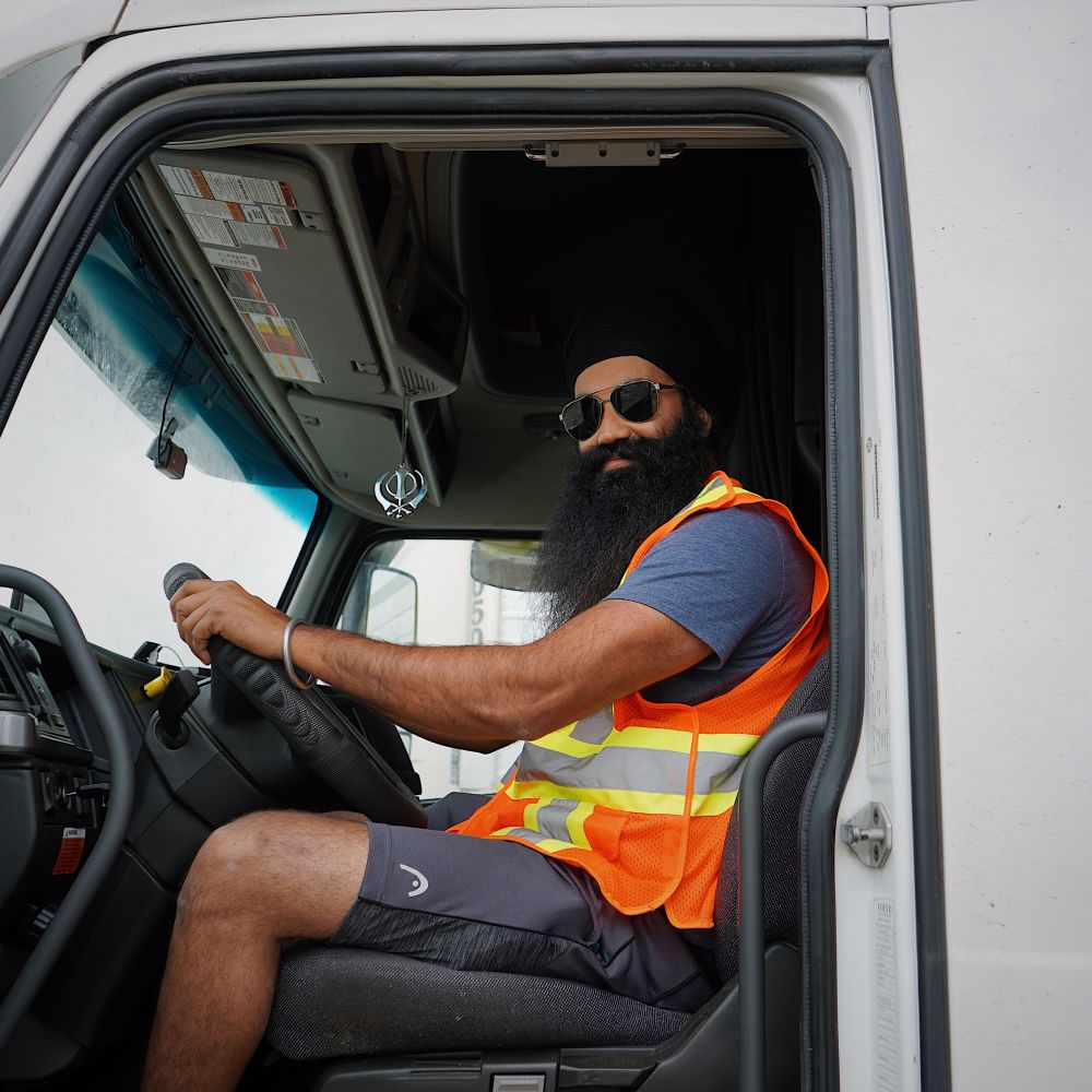 Stanwick — man and van team loading a removal van