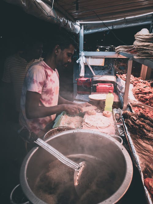 Foto profissional grátis de alimento, cozimento, homem