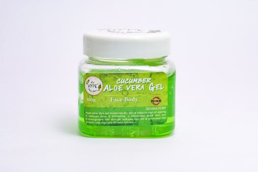 Cucumber Aloe Vera gel in clear plastic jar on white background. Ideal for skincare routines.