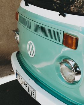 Close-up of the front of a vintage Volkswagen van with a classic retro design.