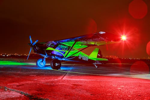 Illuminated Light Aircraft at Night