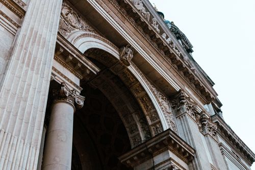 Free Low angle view of the intricate design and ornate pillars of a historic Budapest landmark. Stock Photo