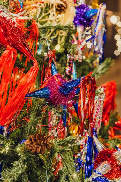 Close-up of Colorful Christmas Ornaments Hanging on a Tree
