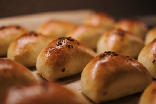 Freshly baked golden pastries with a shiny glaze, perfect for bakery promotions.