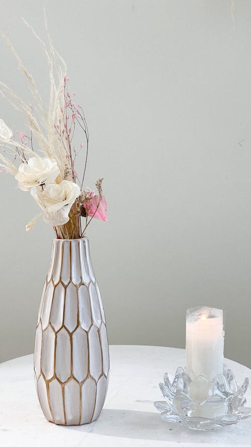 Decorative Vase with Flowers and Wax Candle