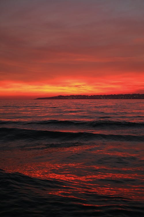 Red Sky at Sunset over Sea Shore