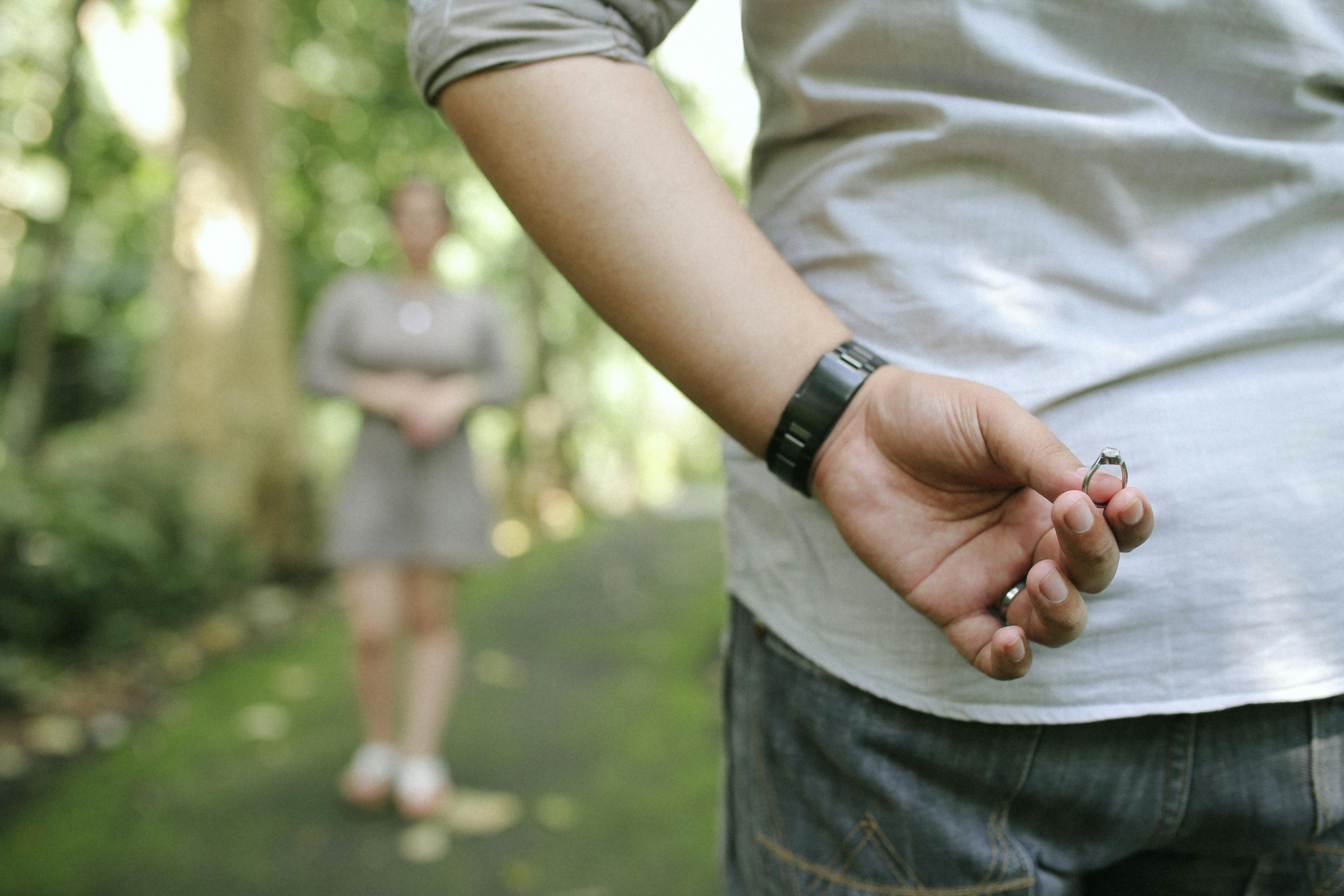 A photo of a man holding a ring. | Photo: Pexels