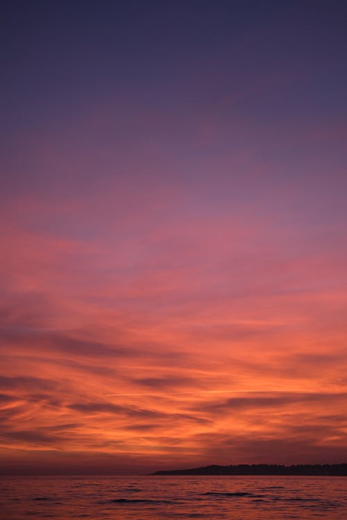 地平線 垂直拍攝 壁紙 多雲的 天性 天空 戲劇化 日落 水面 海 海洋 漂亮 美景 背景 自然攝影 雲 電影 風景如畫的免費圖庫相片