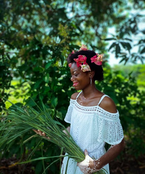 Smiling Woman with Flowers in Hair