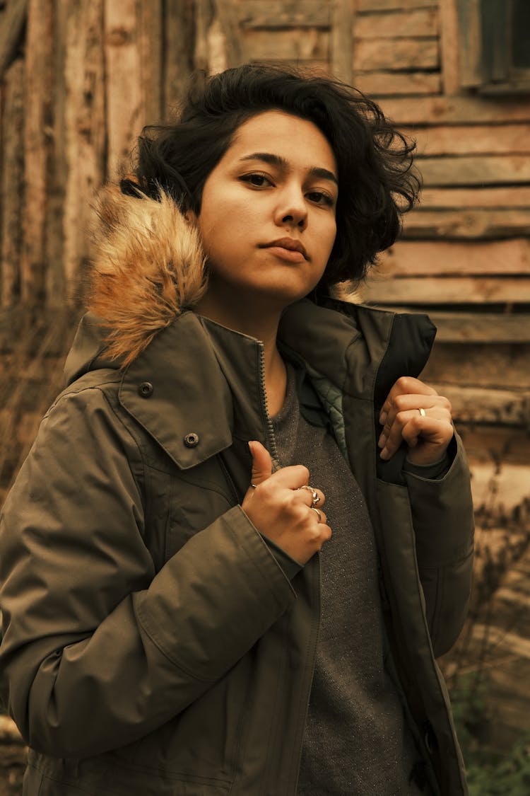 A Woman Wearing A Parka Jacket