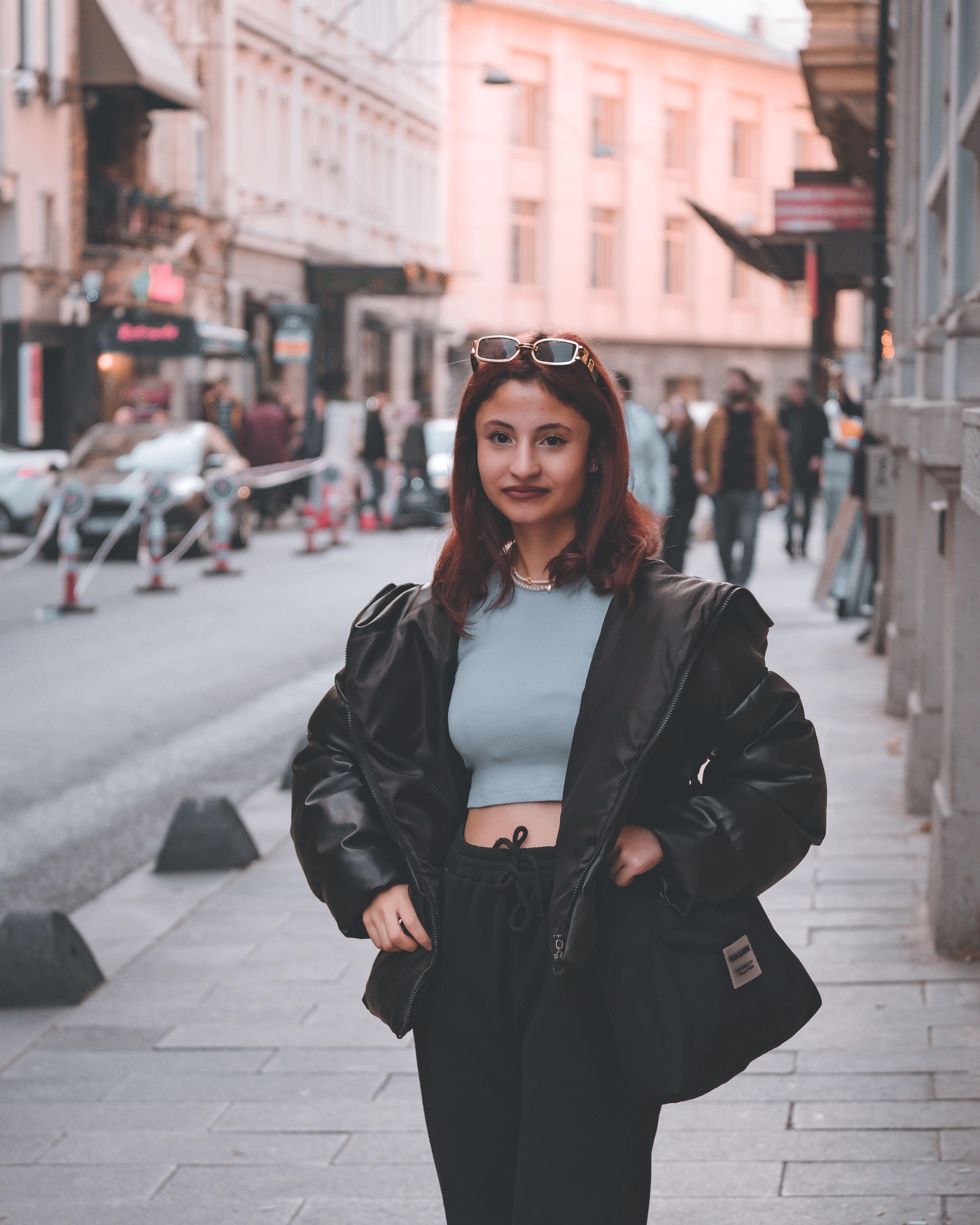 Female Model Standing in Front of a Fence · Free Stock Photo