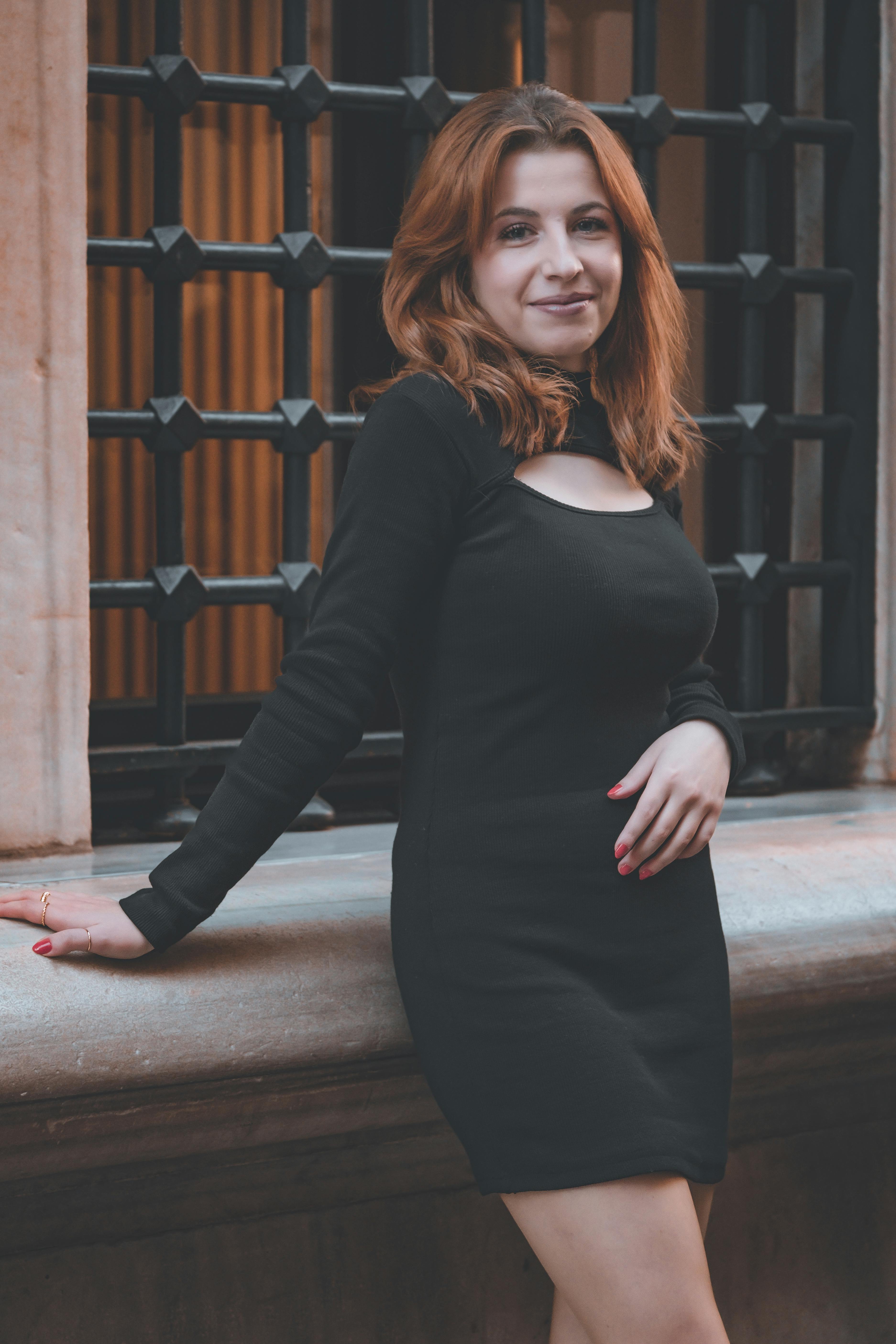 Short black dress with long outlet boots