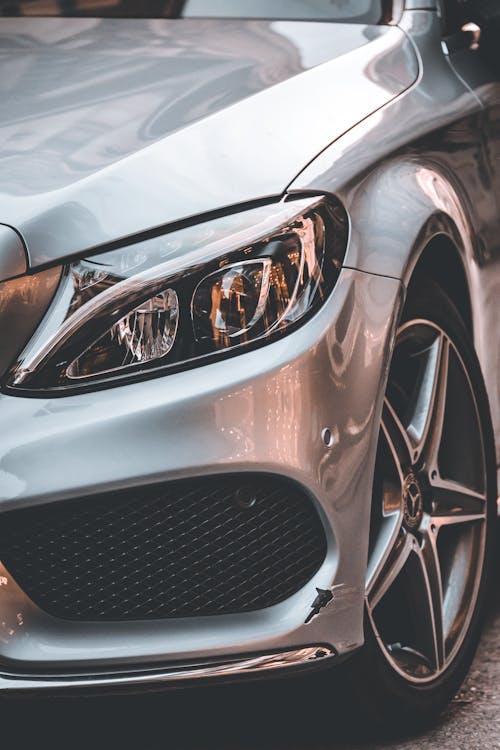 A Silver Car with Headlight