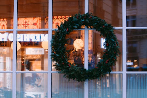 Christmas Wreath Hanging on Glass Wall 