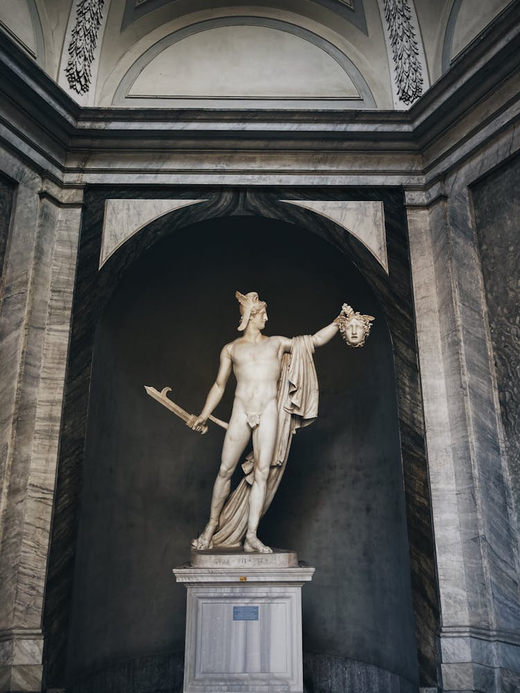 The Statue Of Perseus Holding The Head Of Medusa